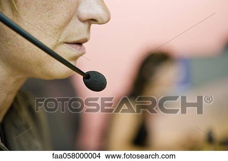 Operator using headset View Large Photo Image Picture - Operator using headset. Fotosearch