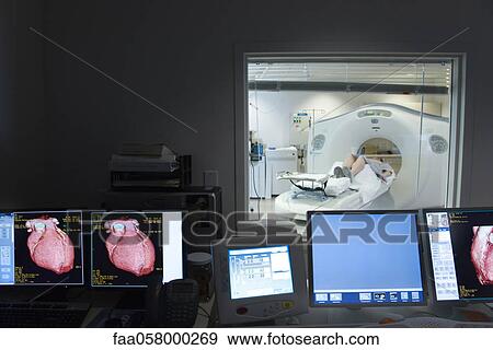Patient undergoing CAT scan View Large Photo Image Stock Photo - Patient undergoing CAT scan. Fotosearch