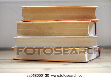 Stacked books, close-up View Large Photo Image Stock Image - Stacked books, close-up. Fotosearch