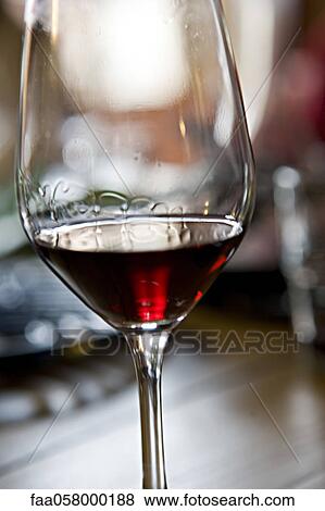 Tears of wine on glass of red wine View Large Photo Image Stock Photo - Tears of wine on glass of red wine. Fotosearch