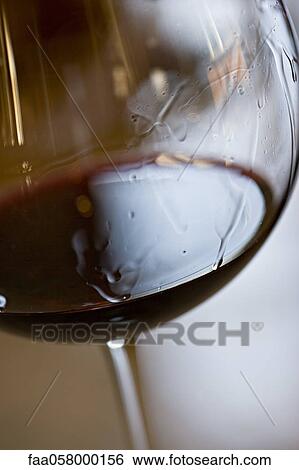 Tears of wine on glass of red wine View Large Photo Image Stock Photograph - Tears of wine on glass of red wine. Fotosearch