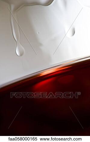 Tears of wine on glass of red wine, close-up View Large Photo Image Stock Photography - Tears of wine on glass of red wine, close-up. Fotosearch