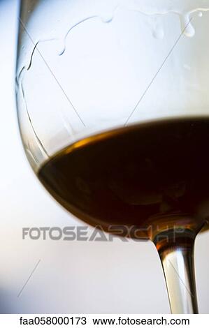 Tears of wine on glass of wine View Large Photo Image Stock Image - Tears of wine on glass of wine. Fotosearch