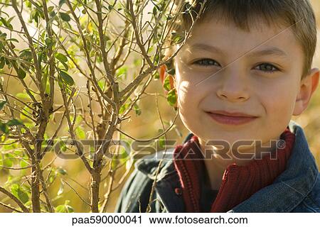 Young boy, portrait View Large Photo Image Stock Image - Young boy, portrait. Fotosearch