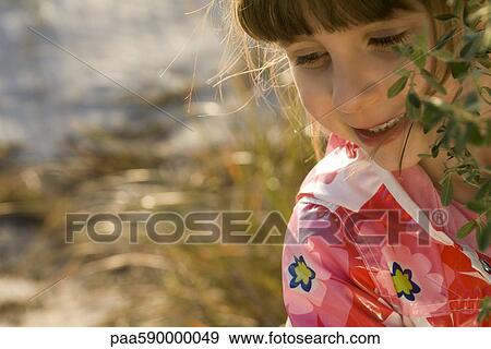 Young girl outdoors, portrait View Large Photo Image Stock Photo - Young girl outdoors, portrait. Fotosearch