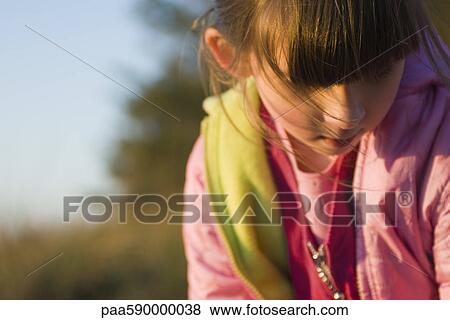 Young girl outdoors View Large Photo Image Stock Photo - Young girl outdoors. Fotosearch