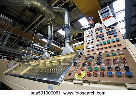 Stock Image - Carpet tile factory, shearing machine. Fotosearch