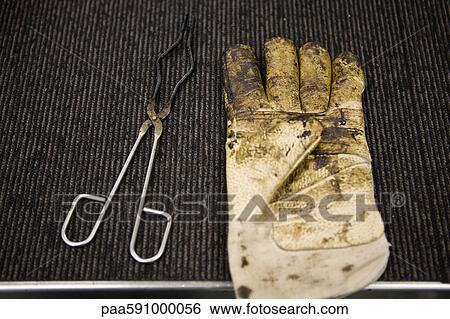 Carpet tile factory, testing lab, safety glove and crucible tongs covered in bitumen View Large Photo Image Stock Photograph - Carpet tile factory, testing lab, safety glove and crucible tongs covered in bitumen. Fotosearch