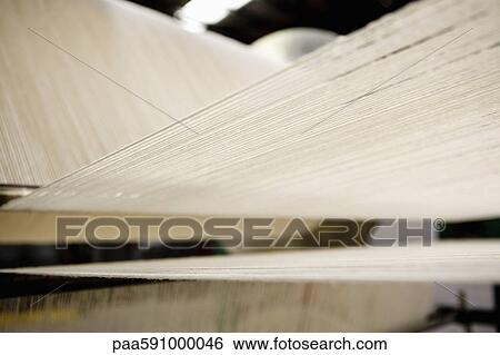 Carpet weaving loom in carpet tile factory View Large Photo Image Stock Photograph - Carpet weaving loom in carpet tile factory. Fotosearch