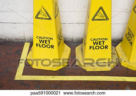 Caution wet floor signs View Large Photo Image Stock Image - Caution wet floor signs. Fotosearch