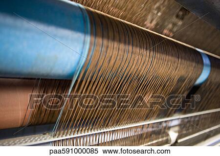 Loom weaving carpet in carpet tile factory View Large Photo Image Stock Photography - Loom weaving carpet in carpet tile factory. Fotosearch