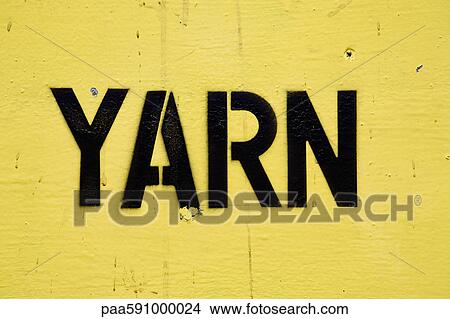 Stenciled lettering on sign reading "yarn" View Large Photo Image Picture - Stenciled lettering on sign reading "yarn". Fotosearch