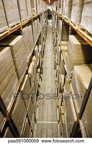 Warehouse filled with stacked pallets of cardboard boxes, elevated view View Large Photo Image Stock Photo - Warehouse filled with stacked pallets of cardboard boxes, elevated view. Fotosearch