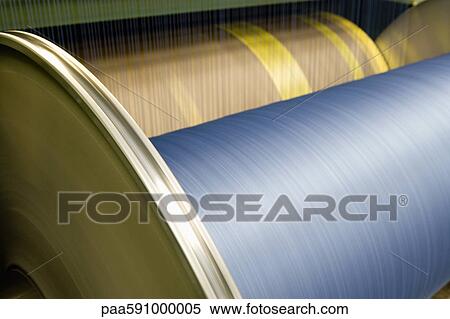 Warp beam of weaving machine loom in carpet tile factory View Large Photo Image Stock Photography - Warp beam of weaving machine loom in carpet tile factory. Fotosearch