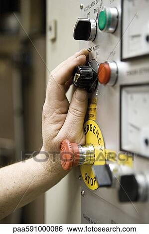 Worker adjusting speed knob on shearing machine control panel in carpet tile factory View Large Photo Image Stock Photograph - Worker adjusting speed knob on shearing machine control panel in carpet tile factory. Fotosearch