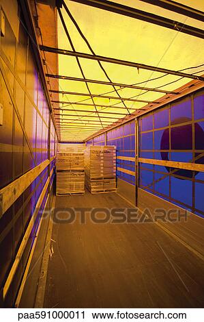 Wrapped pallets of cardboard boxes in trailer for delivery View Large Photo Image Stock Image - Wrapped pallets of cardboard boxes in trailer for delivery. Fotosearch