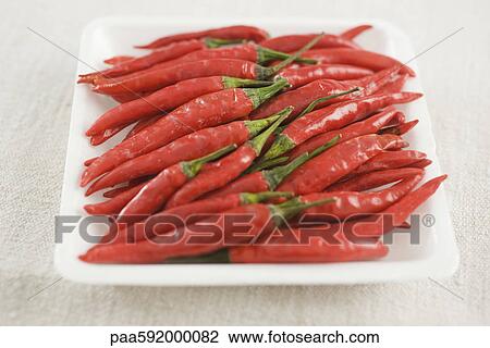 Fresh red chili peppers View Large Photo Image Stock Image - Fresh red chili peppers. Fotosearch