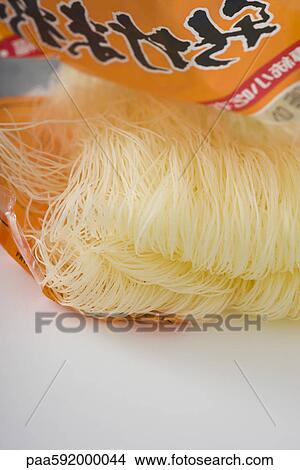 Open cellophane package of vermicelli View Large Photo Image Picture - Open cellophane package of vermicelli. Fotosearch