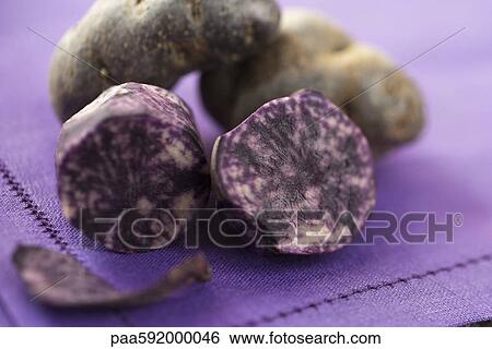 Purple potatoes View Large Photo Image Stock Photograph - Purple potatoes. Fotosearch