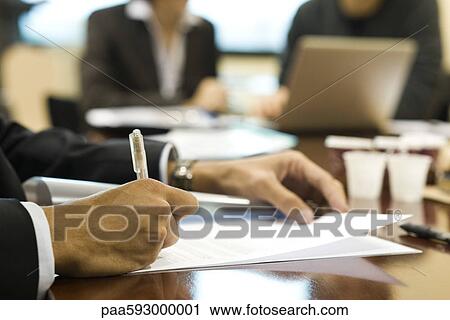 Executive signing document, cropped View Large Photo Image Stock Image - Executive signing document, cropped. Fotosearch