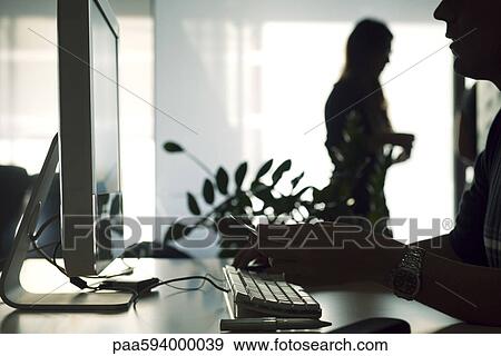 People in office, backlit View Large Photo Image Stock Photo - People in office, backlit. Fotosearch