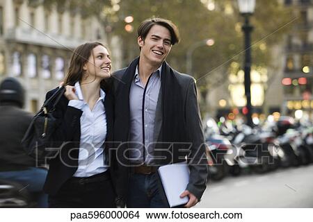 Picture - Couple crossing street together. Fotosearch
