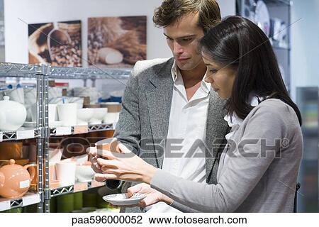 Couple shopping together View Large Photo Image Stock Image - Couple shopping together. Fotosearch