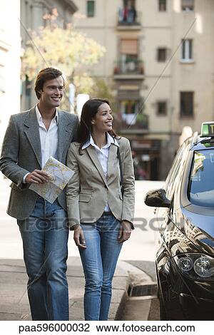 Stock Image - Couple sightseeing together. Fotosearch