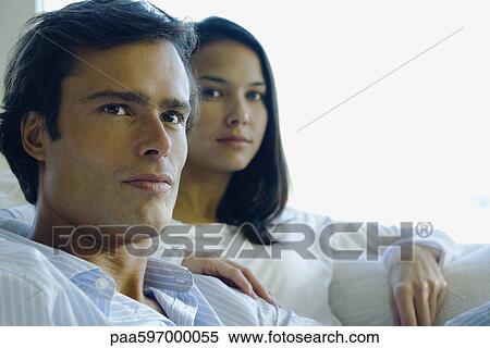 Couple relaxing together View Large Photo Image Stock Photography - Couple relaxing together. Fotosearch