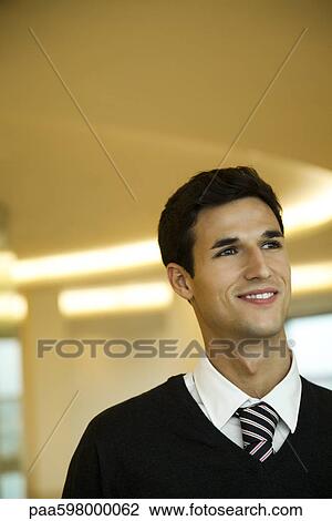 Businessman looking away in thought, portrait View Large Photo Image Stock Image - Businessman looking away in thought, portrait. Fotosearch