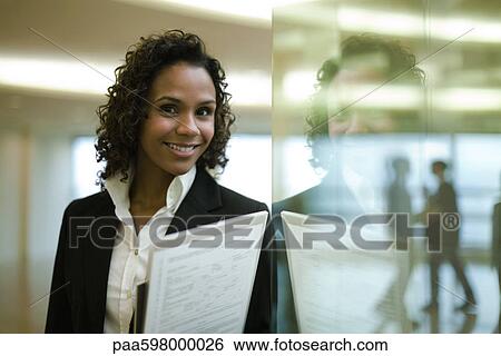 Businesswoman smiling, portrait View Large Photo Image Stock Photograph - Businesswoman smiling, portrait. Fotosearch