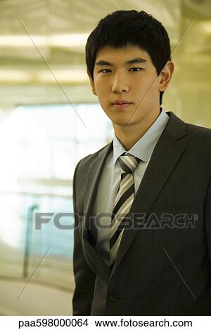 Young businessman, portrait View Large Photo Image Picture - Young businessman, portrait. Fotosearch