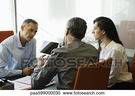 Businessman meeting with clients View Large Photo Image Stock Image - Businessman meeting with clients. Fotosearch