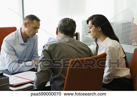 Businessman meeting with clients View Large Photo Image Stock Image - Businessman meeting with clients. Fotosearch