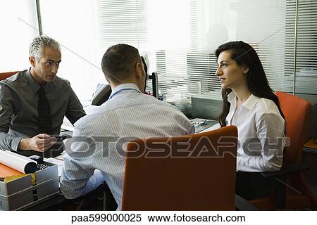 Businessman meeting with clients View Large Photo Image Stock Photography - Businessman meeting with clients. Fotosearch