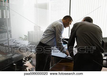 Businessmen in disccusion View Large Photo Image Stock Image - Businessmen in disccusion. Fotosearch