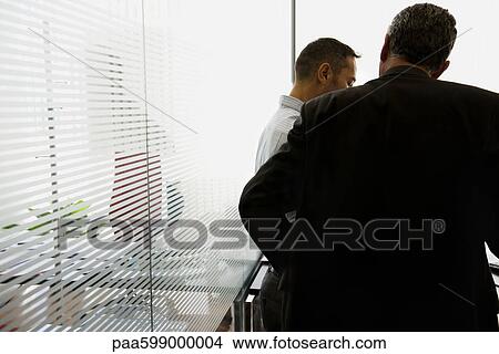 Businessmen in office View Large Photo Image Picture - Businessmen in office. Fotosearch