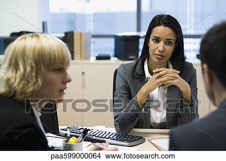 Executives in meeting View Large Photo Image Picture - Executives in meeting. Fotosearch