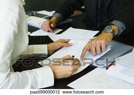 Person signing paperwork, cropped View Large Photo Image Stock Image - Person signing paperwork, cropped. Fotosearch