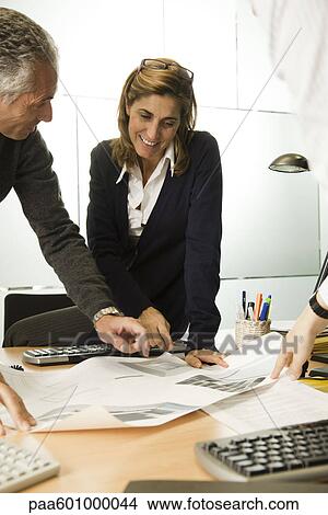 Businesswoman working in office View Large Photo Image Picture - Businesswoman working in office. Fotosearch