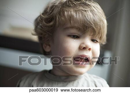 Toddler boy crying, portrait View Large Photo Image Stock Photo - Toddler boy crying, portrait. Fotosearch