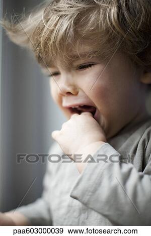 Toddler boy crying, portrait View Large Photo Image Stock Photo - Toddler boy crying, portrait. Fotosearch