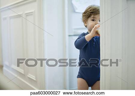 Toddler boy drinking from bottle View Large Photo Image Stock Photo - Toddler boy drinking from bottle. Fotosearch