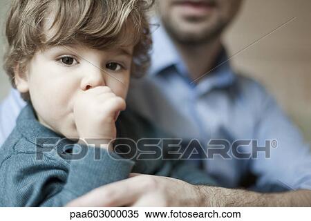 Toddler boy sucking thumb, portrait View Large Photo Image Stock Photography - Toddler boy sucking thumb, portrait. Fotosearch