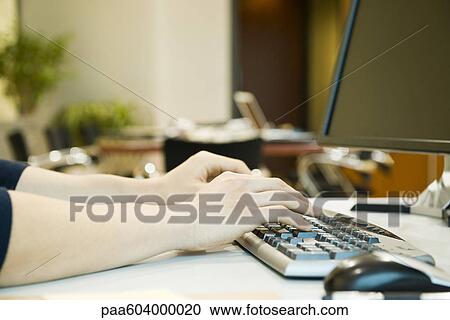 Person typing on computer keyboard, cropped View Large Photo Image Stock Image - Person typing on computer keyboard, cropped. Fotosearch