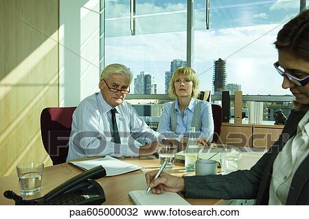 Business people in meeting View Large Photo Image Stock Image - Business people in meeting. Fotosearch