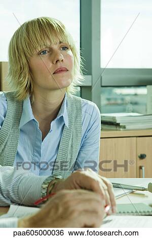 Executive looking away in thought View Large Photo Image Stock Photograph - Executive looking away in thought. Fotosearch