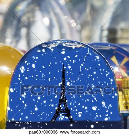 Figurine of Eiffle Tower in snow globe View Large Photo Image Stock Photograph - Figurine of Eiffle Tower in snow globe. Fotosearch