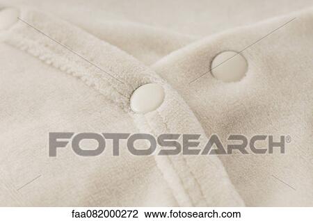 Baby clothing, close-up View Large Photo Image Stock Image - Baby clothing, close-up. Fotosearch