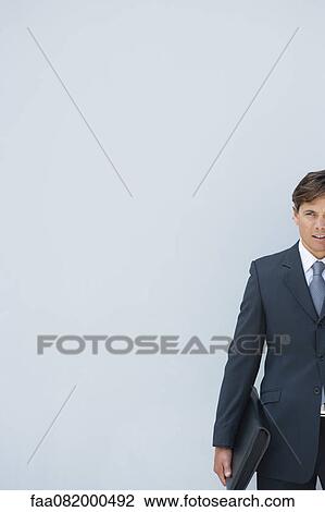 Stock Image - Businessman, cropped. Fotosearch